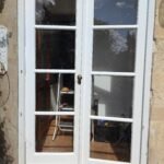 French doors having been repaired and painted